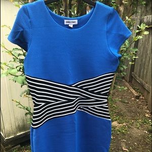 SOLD Dress hug those curves